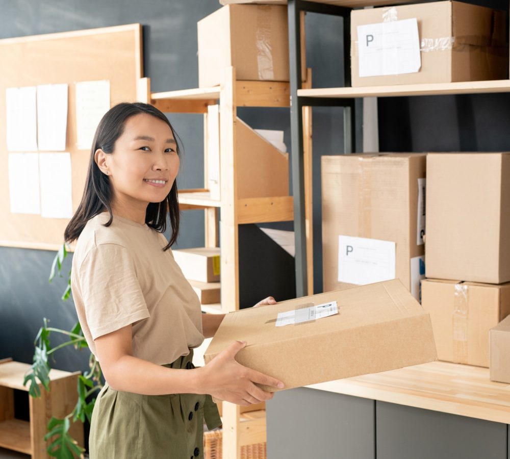 smiling-youngworker-of-post-office-or-storage-room-carrying-order-of-client.jpg smiling-youngworker-of-post-office-or-storage-room-carrying-order-of-client.jpg